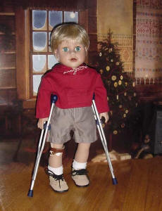 Boy doll with crutches and prosthetics