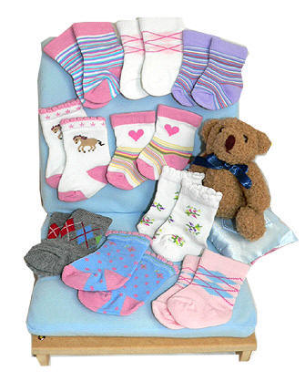 An array of designer doll socks for American girls and Amazing Ally dolls.