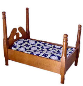Wood bed with coverlet