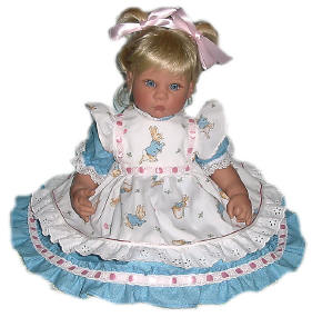Lee Middleton doll wearing a Beatrix Potter Pinafore