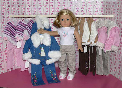 American Girl in front of Doll Clothes