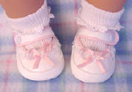 Designer baby shoes with pink trim